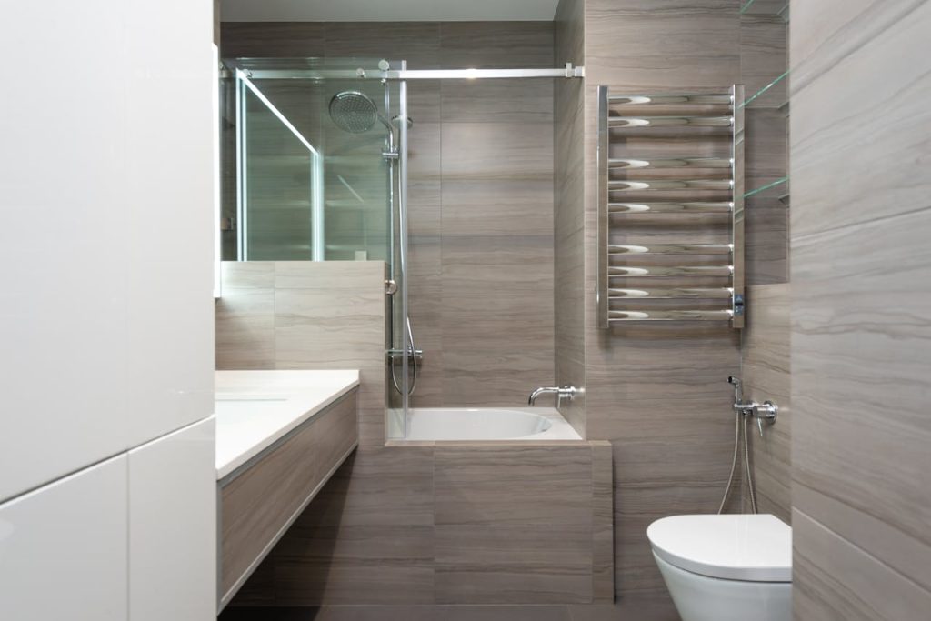 Elegant bathroom featuring modern design, sleek fixtures, and neutral tones for a calming retreat.